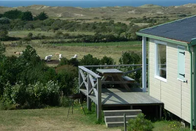 Camping Bel Sito - Chalet mit Veranda auf dem Campingplatz