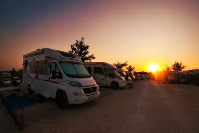 Camper Park Playas de Luz - Sonnenuntergang über den Standplätzen