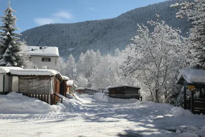 Camping Aprica - Blick auf den verschneiten Campingplatz im Winter