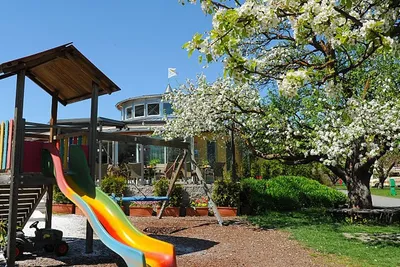 Camping Badlerhof  -  Spielplatz vom Campingplatz mit Rutsche und Schaukel
