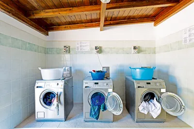 Camping Cala Ginepro - Waschmaschine auf dem Campingplatz