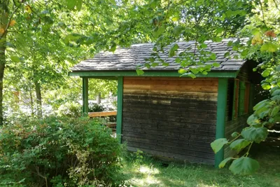 Camping Le Plô  camping le plo  - Mobilheim mit Terrasse auf dem Campingplatz
