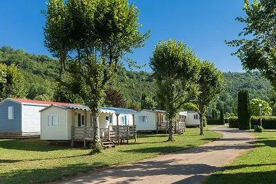 Camping Surchauffant  -  Mobilheime vom Campingplatz mit Veranda