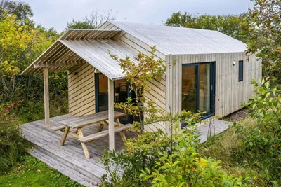Duincamping De Lepelaar  - Mobilheim mit Terrasse auf dem Campingplatz