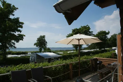 Emmerbølle Strand Camping - mobilheime terrasse mit seeblick