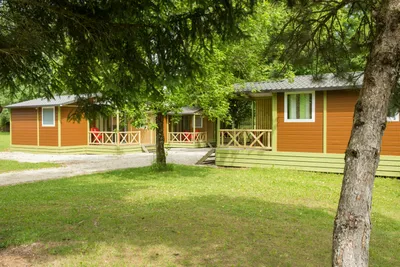 Camping Le Bivouac -  Mobilheime mit Veranda auf dem Campingplatz