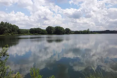 Camping Seasonova les Marguerites  Camping Les Marguerites - Blick auf den See am Campingplatz