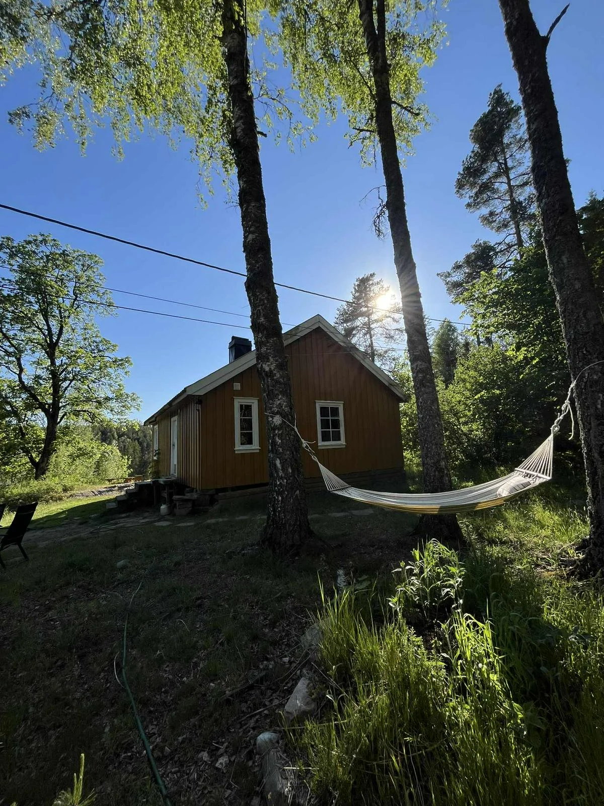 Rustikk tømmerhytte fra