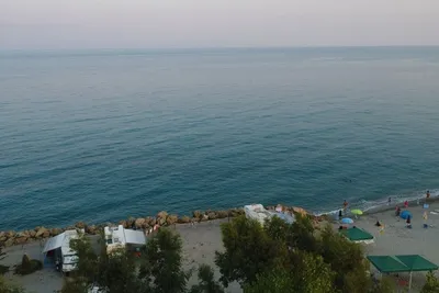 Villaggio Camping Calypso  -  Blick auf den Wohnwagen- und Zeltstellplatz vom Campingplatz mit direktem Zugang zum Mittelmeer