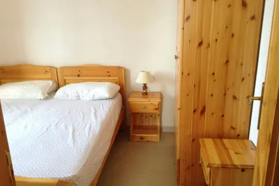 Villaggio Camping La Scogliera  - Schlafbereich im Appartement auf dem Campingplatz